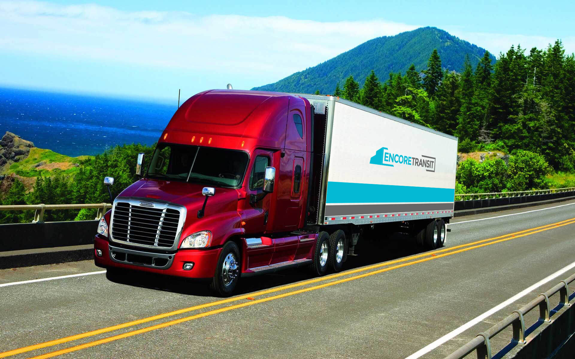 Truck branded with Encore Transit logo design driving on a highway