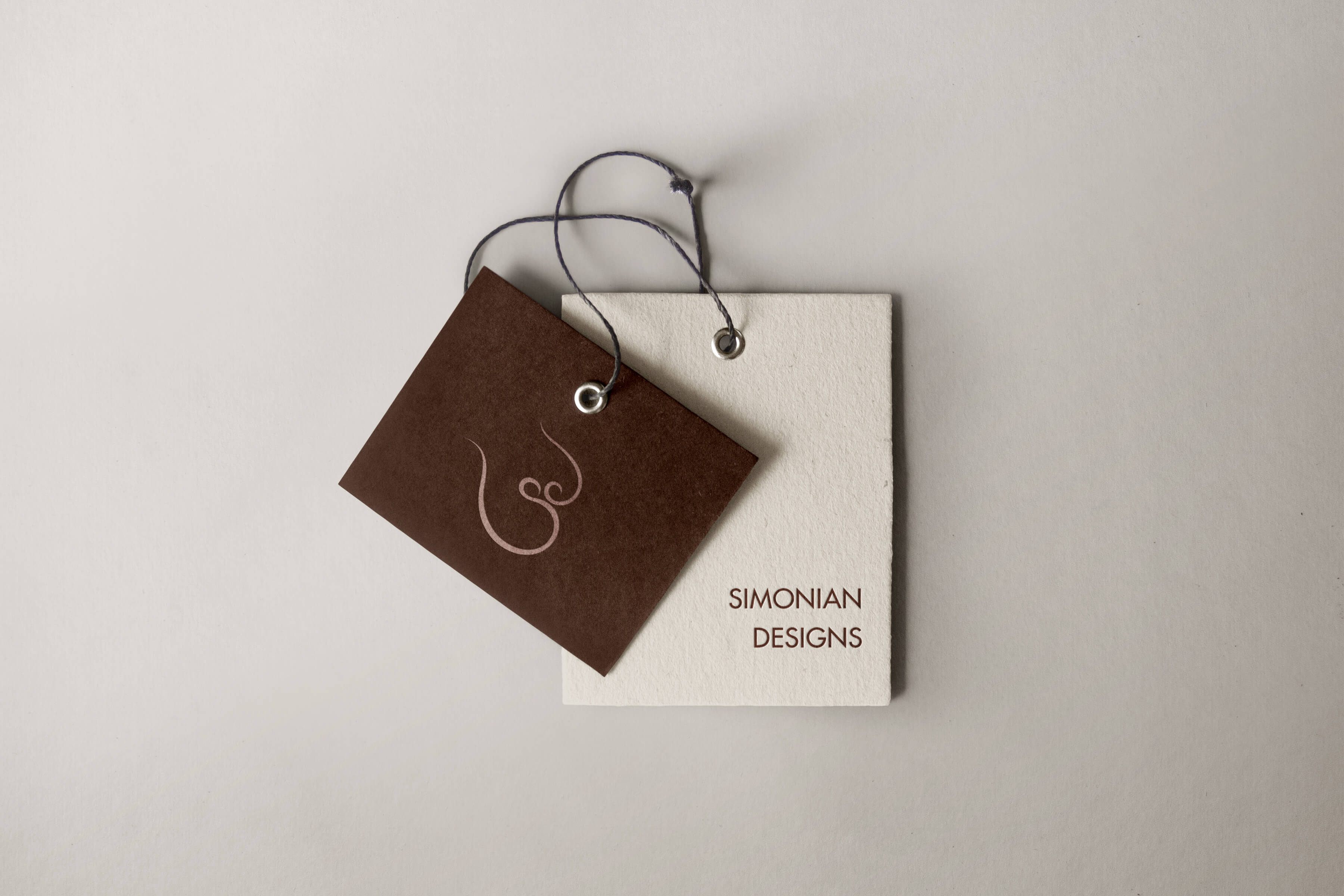 Branded product tags with logo and wordmark